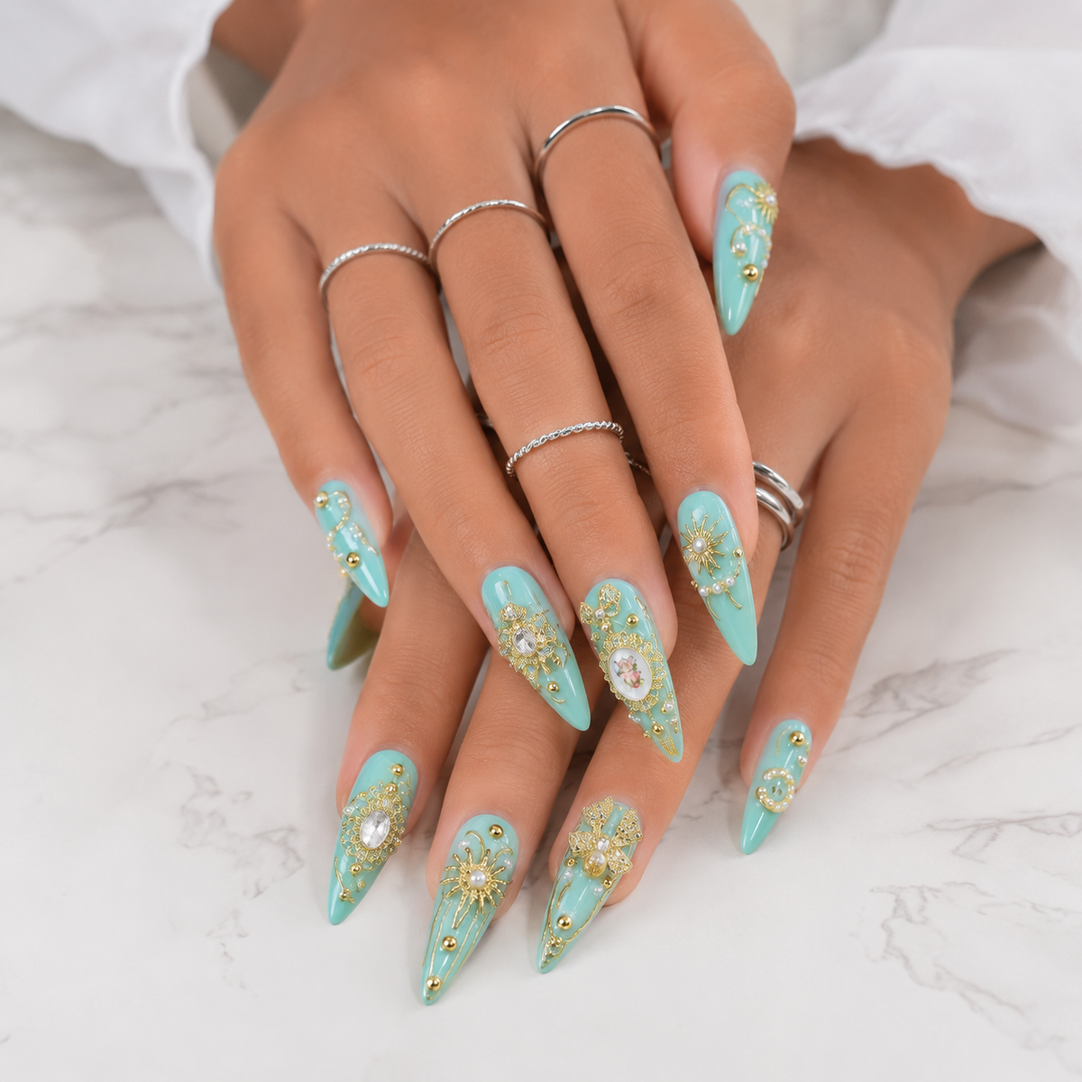 Mint Green Luxury 3D Press On Nails on both hands