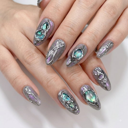 Aurora cat eye press on nails with silver chrome and green crystal effect