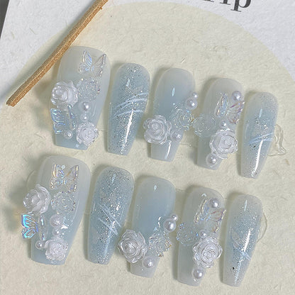 Baby blue 3D press on nail set with flowers, butterflies and pearl details