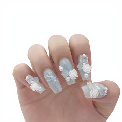Baby blue press on nails with 3D flowers, butterflies, pearls and glitter