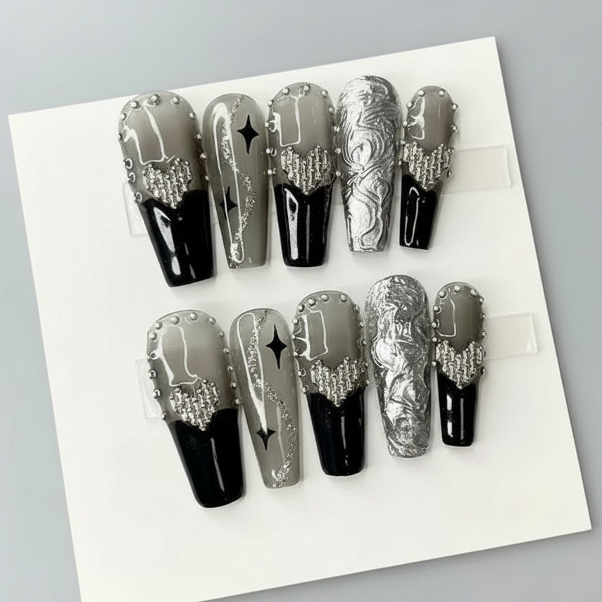 Black and silver chrome press on nails with rhinestones and long coffin design