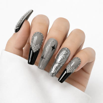 Black and silver coffin press on nails with chrome and rhinestone nail art