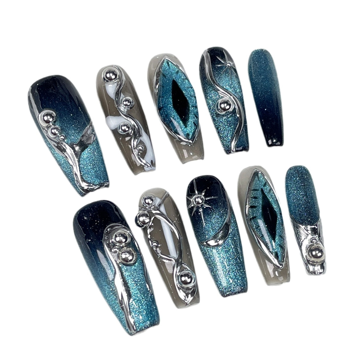 Blue teal cat eye chrome 3D press on nails with metallic silver accents on hand, luxury handmade reusable fake nails, white background.