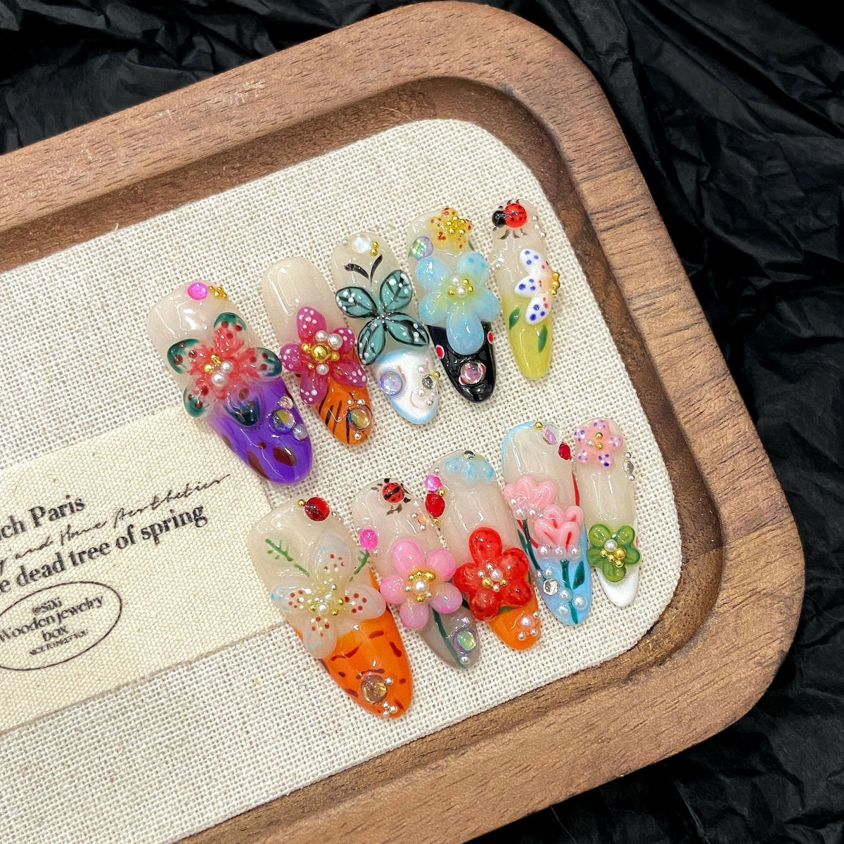 Colorful 3D press on nails full set with floral and butterfly designs