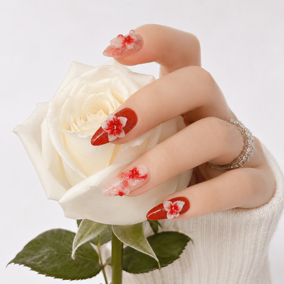 Elegant red floral 3D press on nails holding a white rose, handmade almond fake nails with luxury flower design for weddings and gifts.