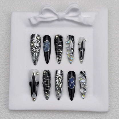 Full set of black silver gothic press on nails with chrome and blue gemstone details