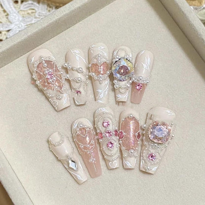Full set of pink pearl press on nails with crystals and 3D embellishments