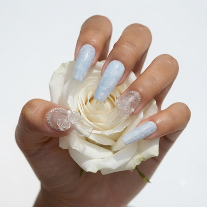 Icy Blue Glitter Press On Nails Holding White Rose