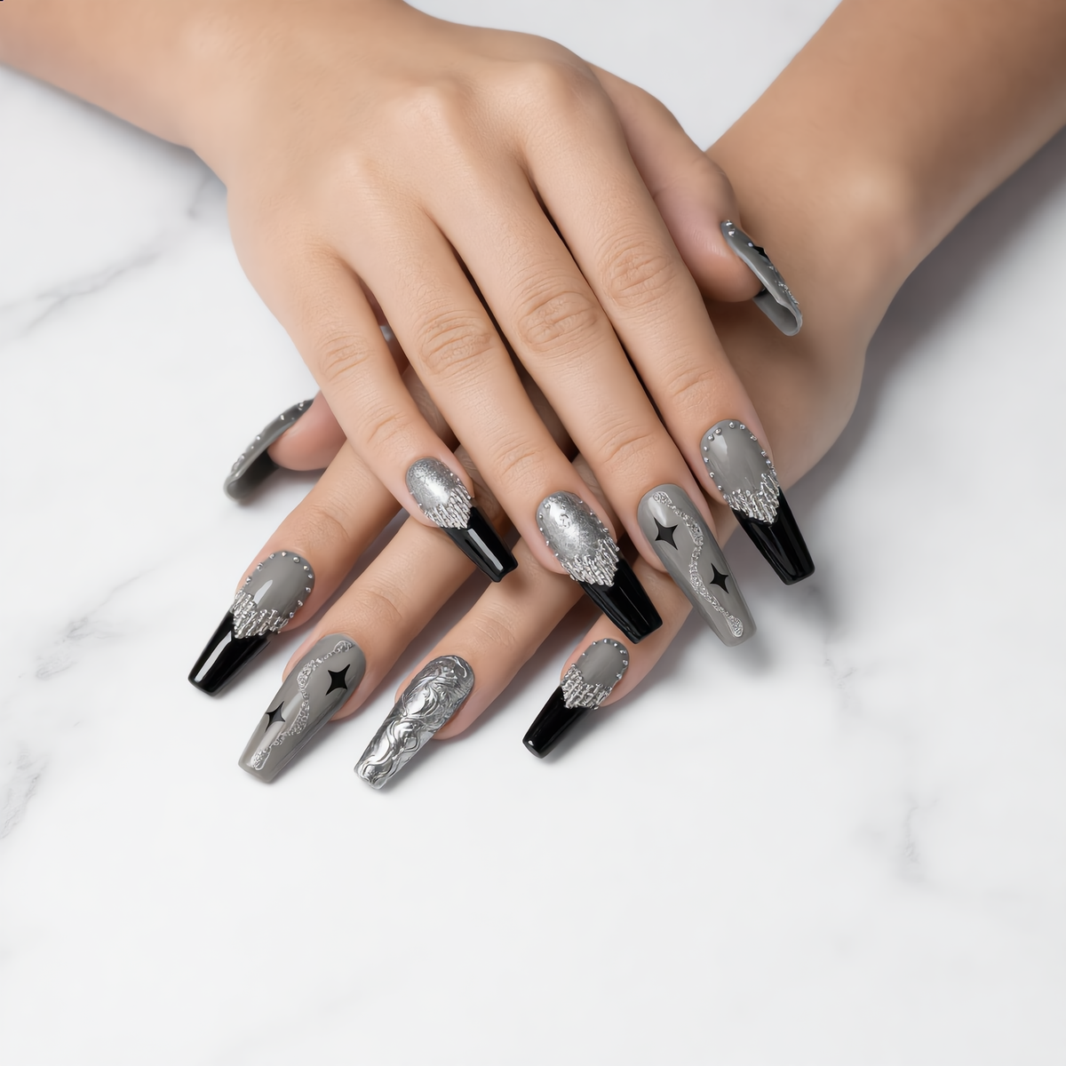 Long black silver press on nails with rhinestones on white marble
