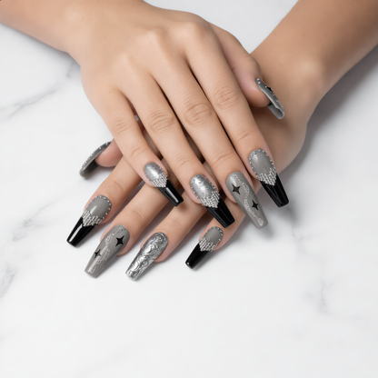 Long black silver press on nails with rhinestones on white marble