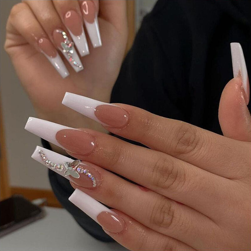 Long coffin white French press on nails with silver butterfly and rhinestone accents