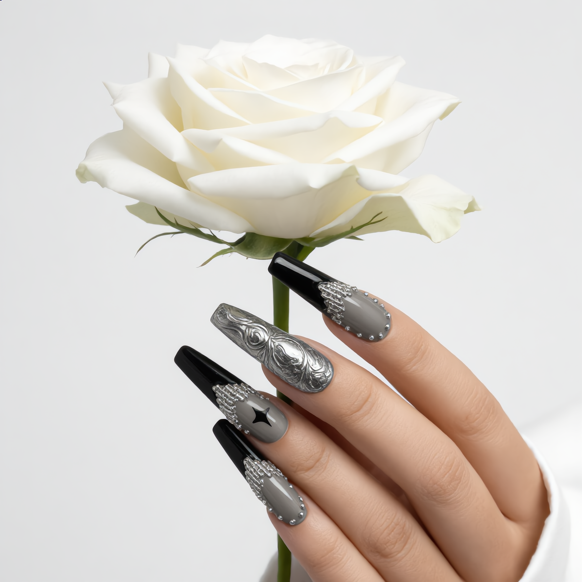 Luxury black chrome press on nails with silver rhinestones and long coffin shape