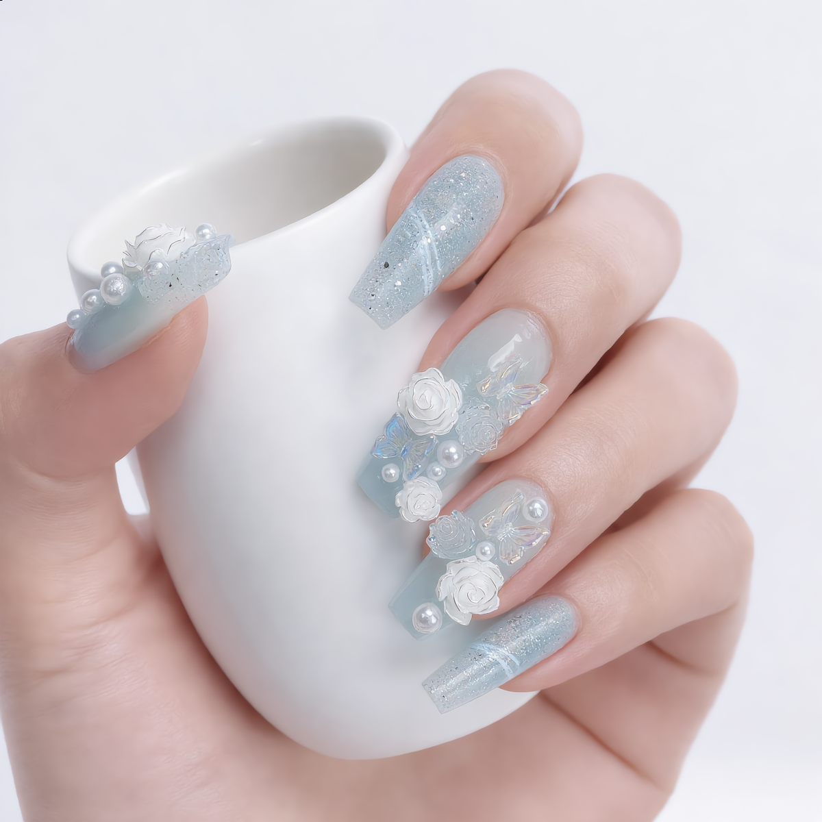Luxury blue press on nails with 3D roses, butterflies and pearl accents