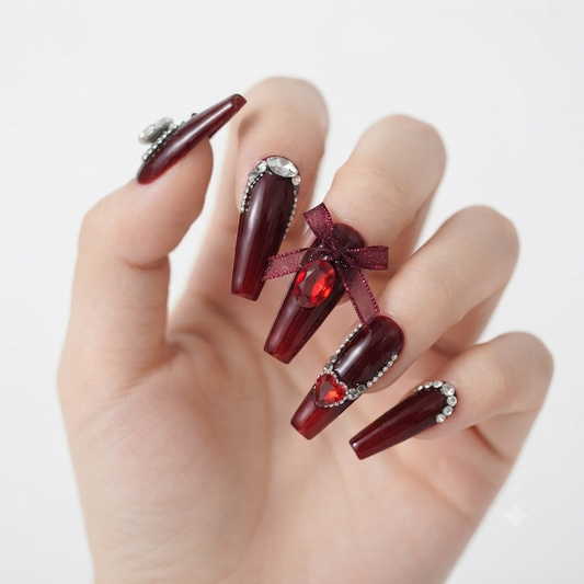 Luxury burgundy press on nails with rhinestones and 3D bow design