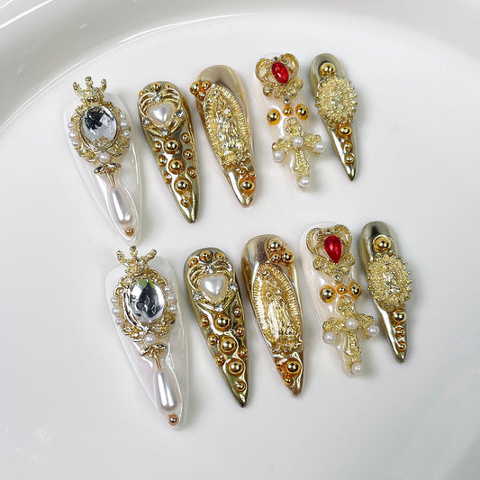 Luxury gold crystal press on nails with ornate baroque charms and rhinestones