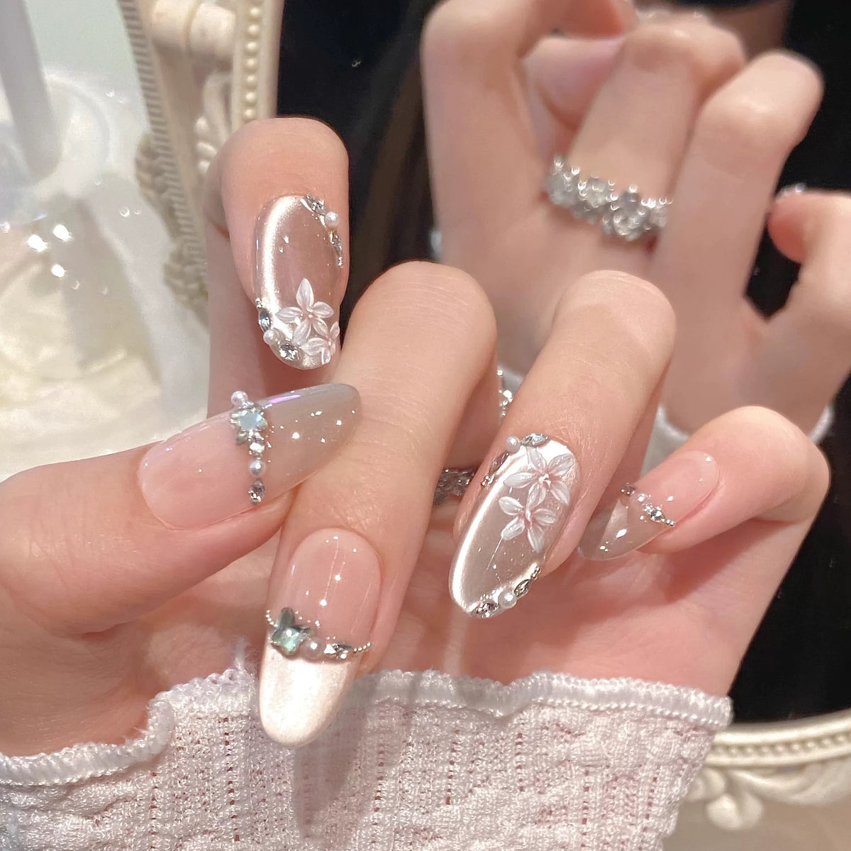 Luxury long floral press on nails with nude shimmer and silver accents