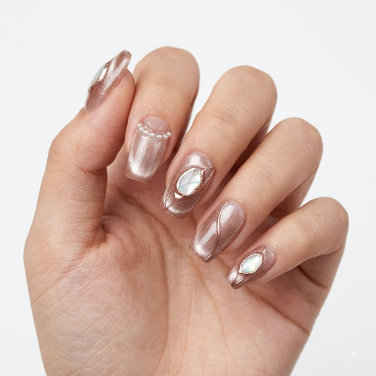 Luxury nude shimmer press on nails with rose gold and iridescent gem design