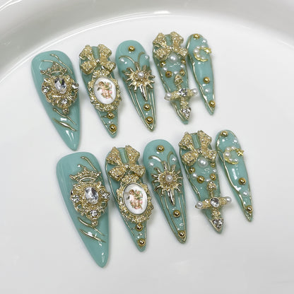 Mint Green Luxury 3D Press On Nails with gold charms, pearls and rhinestones