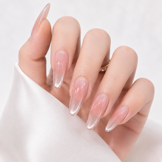 Nude pink silver chrome press on nails with long almond shape and glossy finish