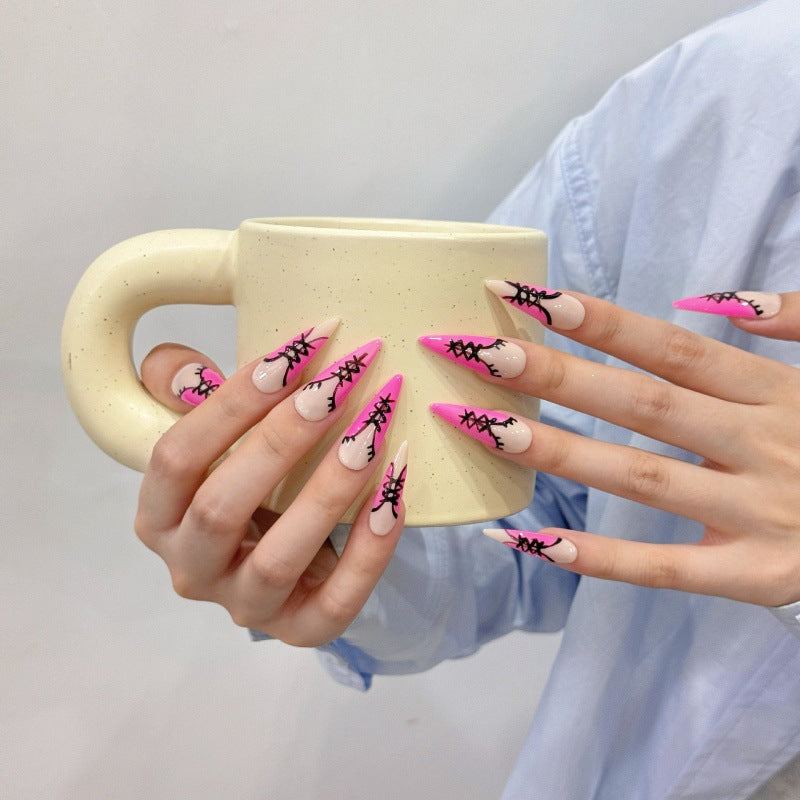 Pink and Blue Long Press On Nails Holding a Mug
