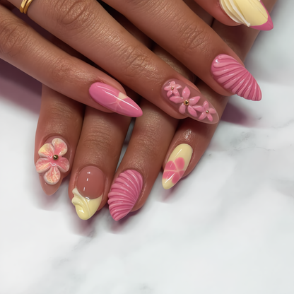Pink and cream 3D floral press on nails displayed on both hands