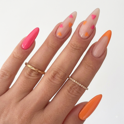 Pink orange heart press on nails with long almond shape and colorful French tips
