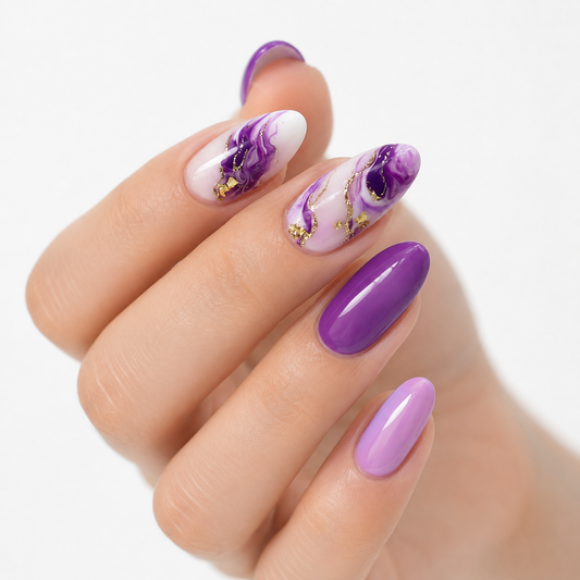 Purple marble press on nails with gold accents and glossy almond shape