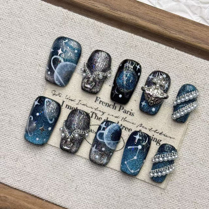Starry night press on nails with galaxy glitter and constellation designs