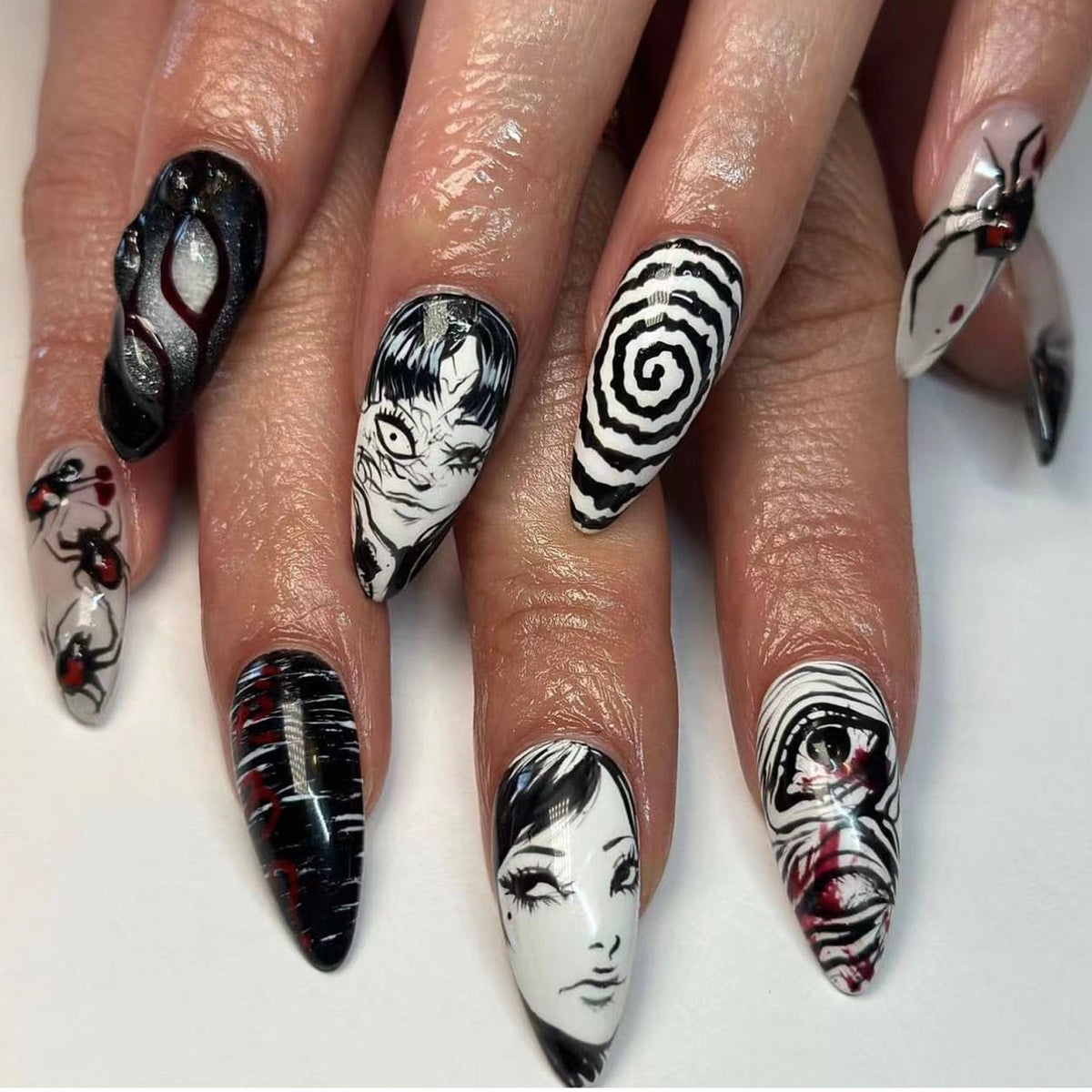 Anime horror press on nails with black white red manga inspired nail art