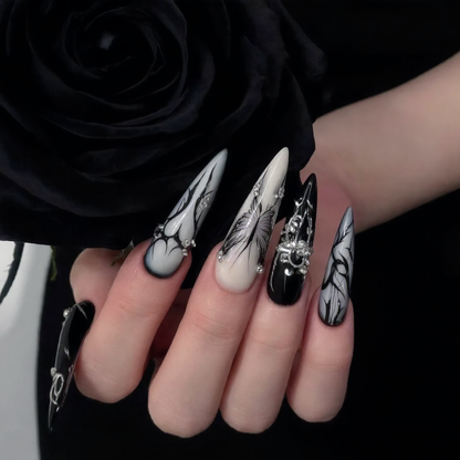 Metallic Illusion Black & Silver Almond Nails