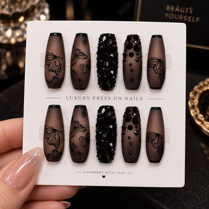 Long coffin black butterfly press-on nails with matte finish and black crystal accents
