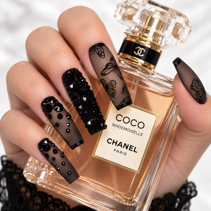 Luxury black butterfly press-on nails with sparkling black rhinestones and elegant matte finish