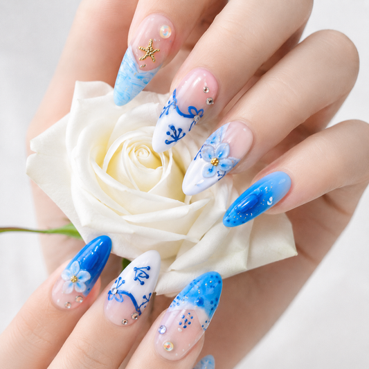 nails.jpg
Blue ocean 3D press on nails with floral details, rhinestones and gold starfish charms