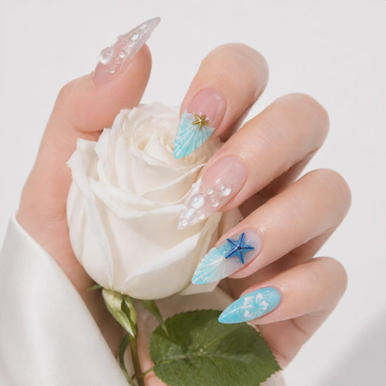 Turquoise floral press on nails with seashell and gold star charms