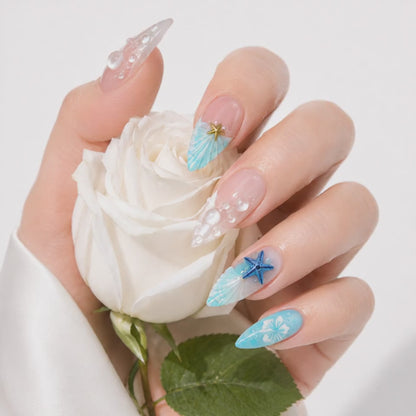 Turquoise floral press on nails with seashell and gold star charms