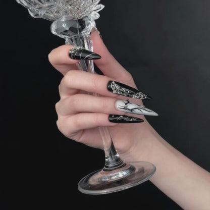 Metallic Illusion Black & Silver Almond Nails