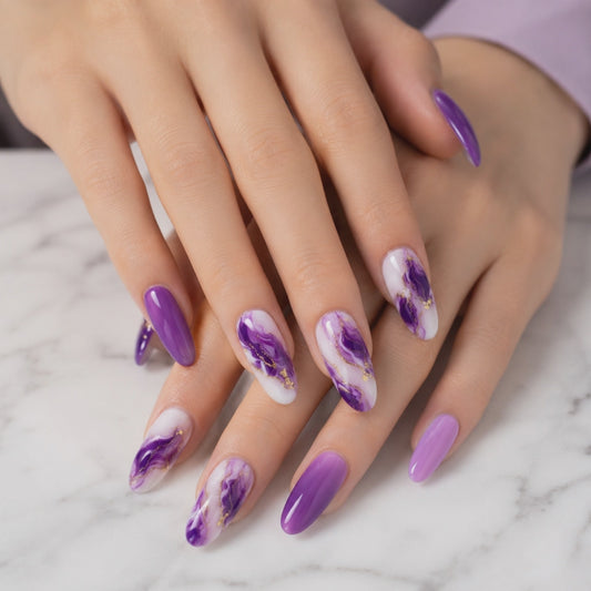 Purple almond press on nails with marble nail art and gold details