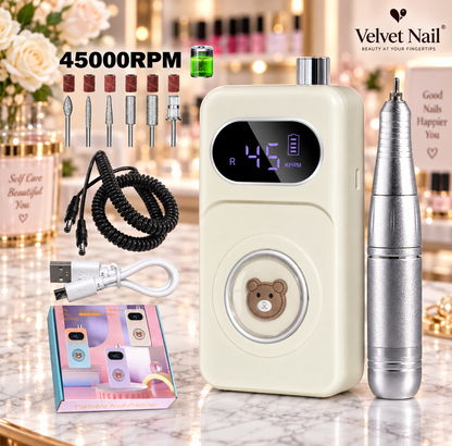 Velvet Nail professional portable nail drill device in elegant pearl cream white color, high-speed 45000 RPM e-file machine for acrylic nails and gel manicures.

